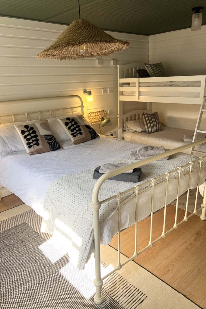Family bedroom in Airbnb Callow End Chalet, styled by Megan Ace near Worcester and Malvern